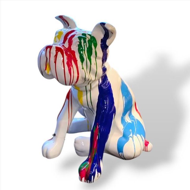 Sculpture sitting dog white with colorful splash