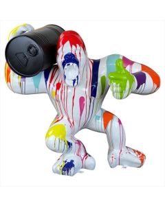 Sculpture gorilla white with colorful splash carrying a black barrel