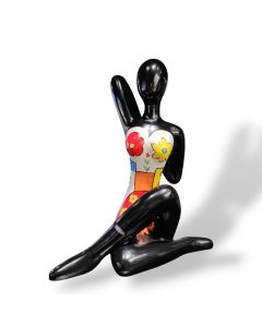 Sculpture yoga lady with flowers